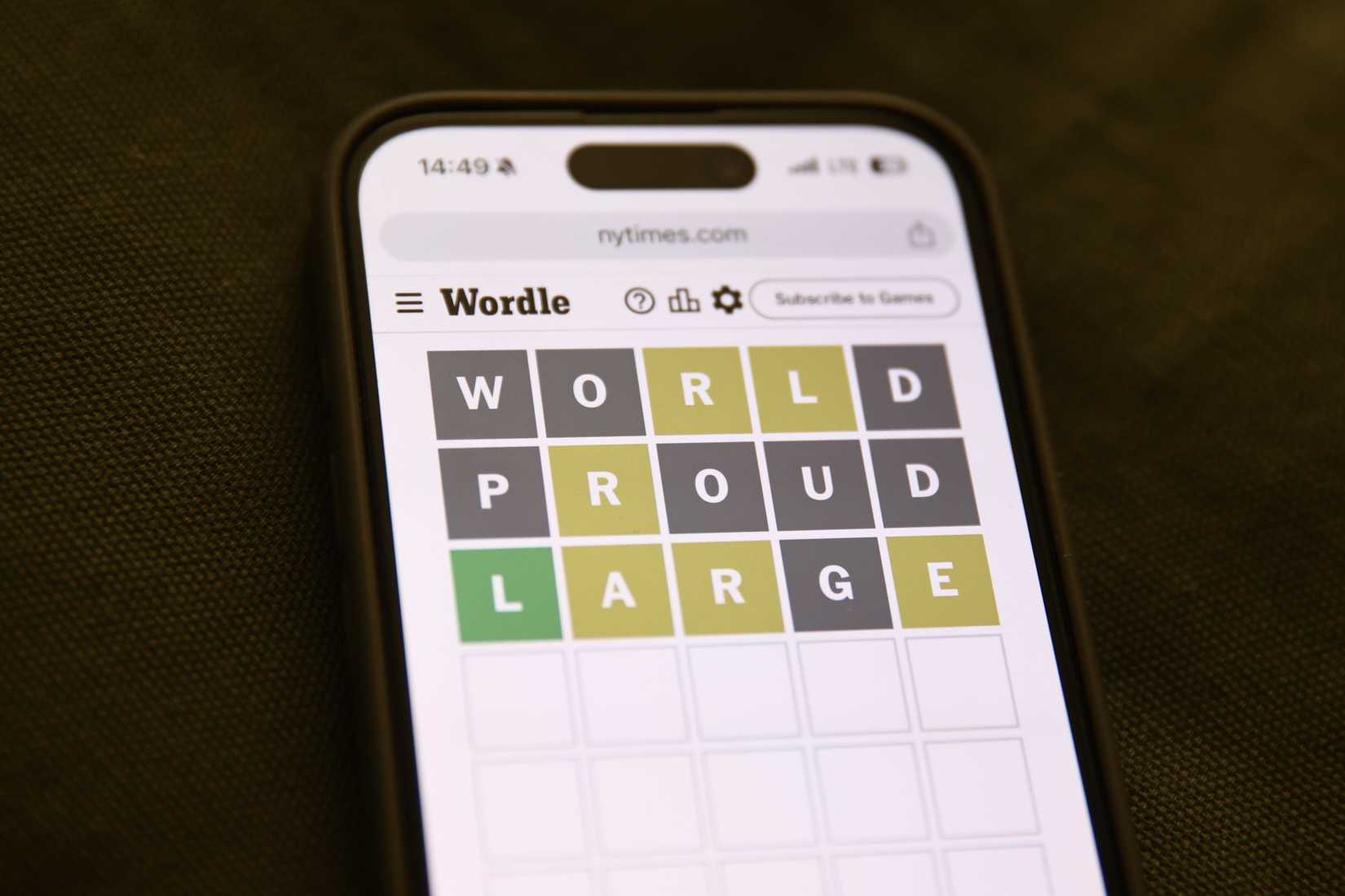 Wordle Game On Phone Photo Illustrations