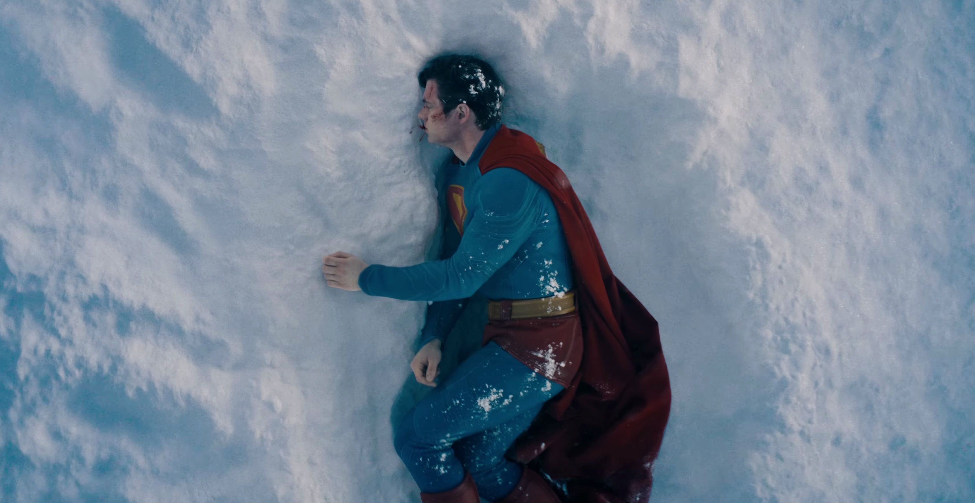 Superman bleeding on the ice in Superman 2025