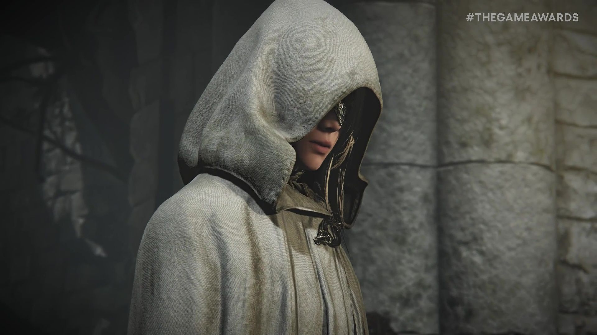 a woman in a hooded gray cloak in Elden Ring Nightreign