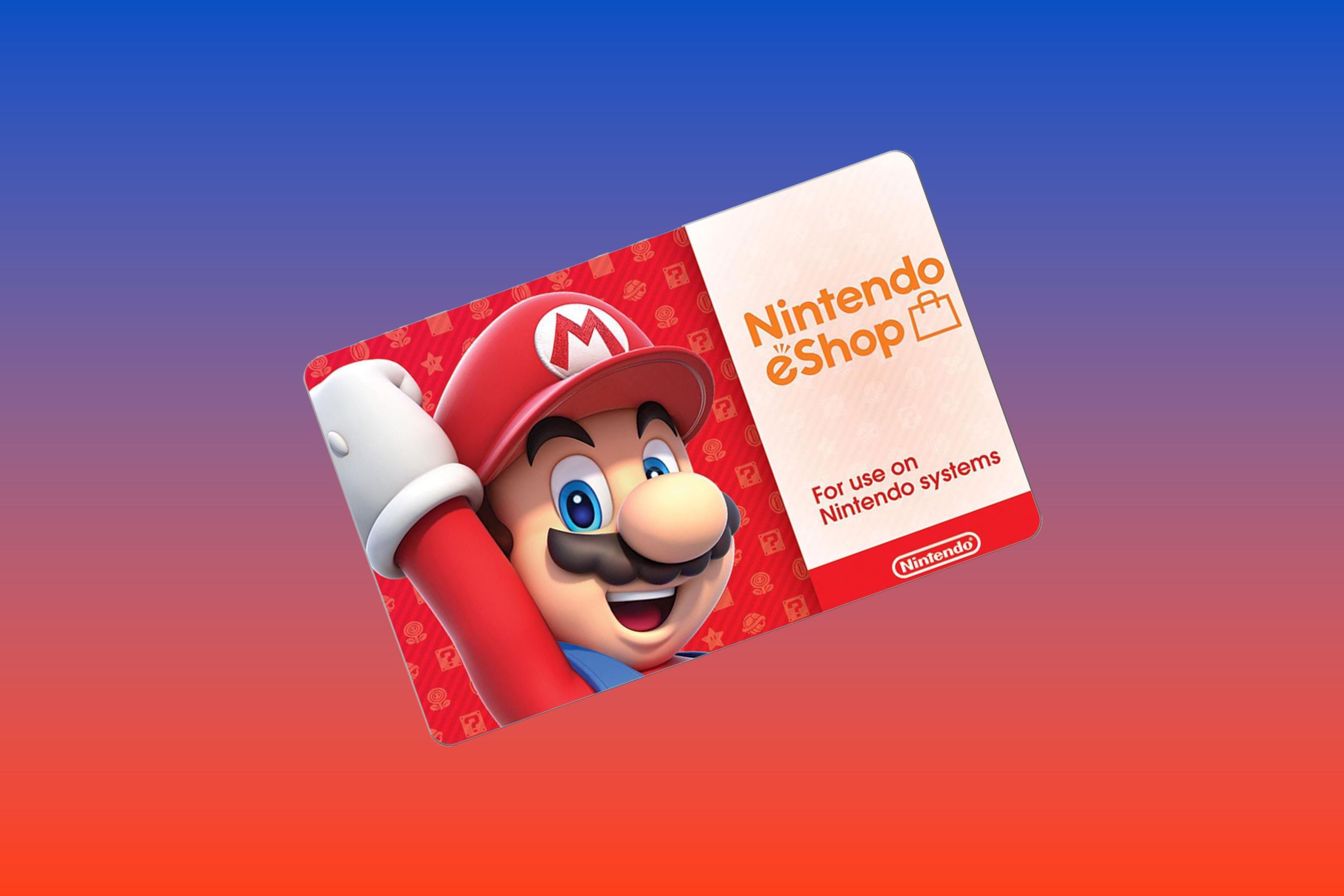 A stack of Nintendo eShop gift cards in various denominations on a wooden table next to a Nintendo Switch console