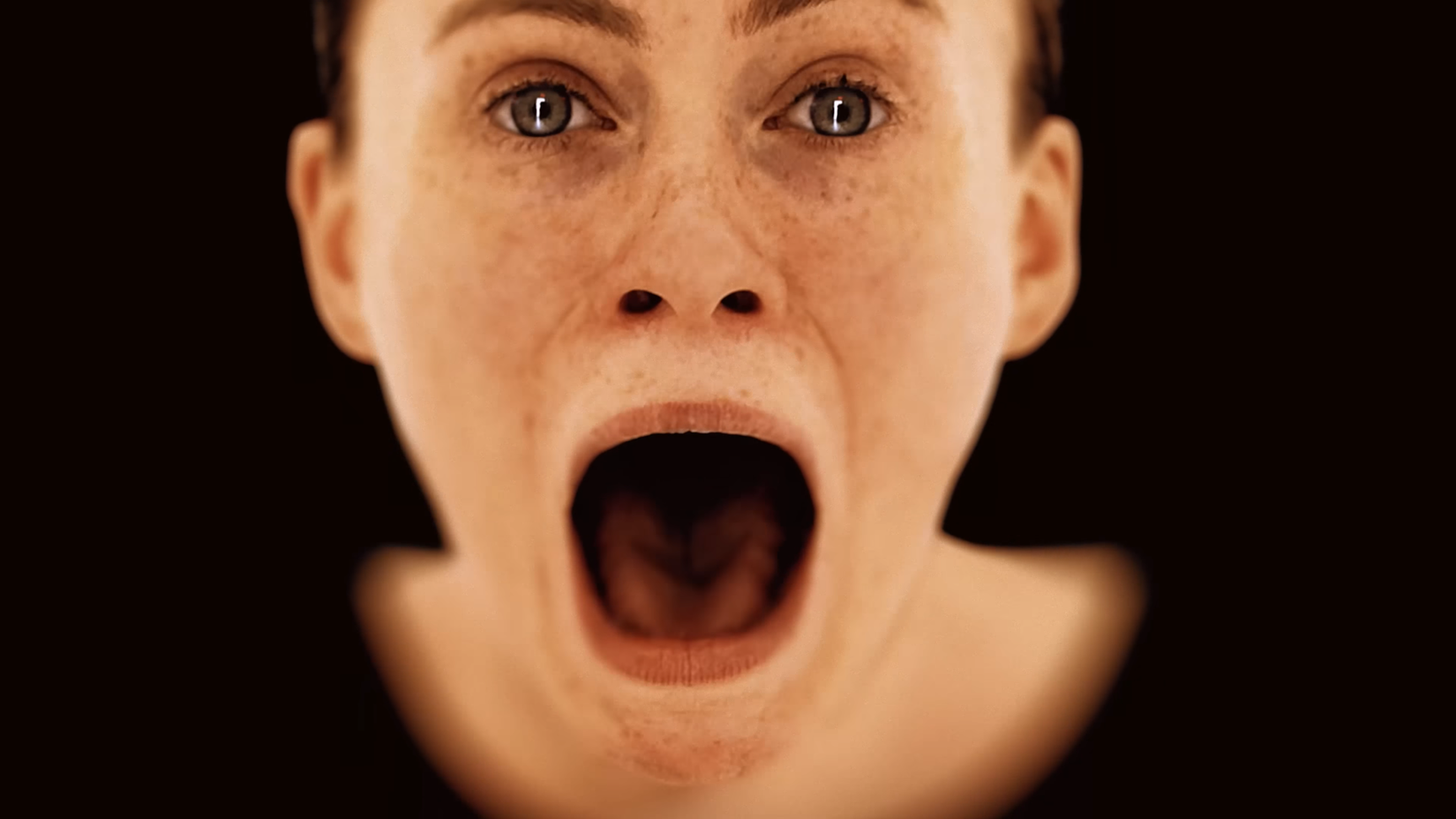A young woman screaming