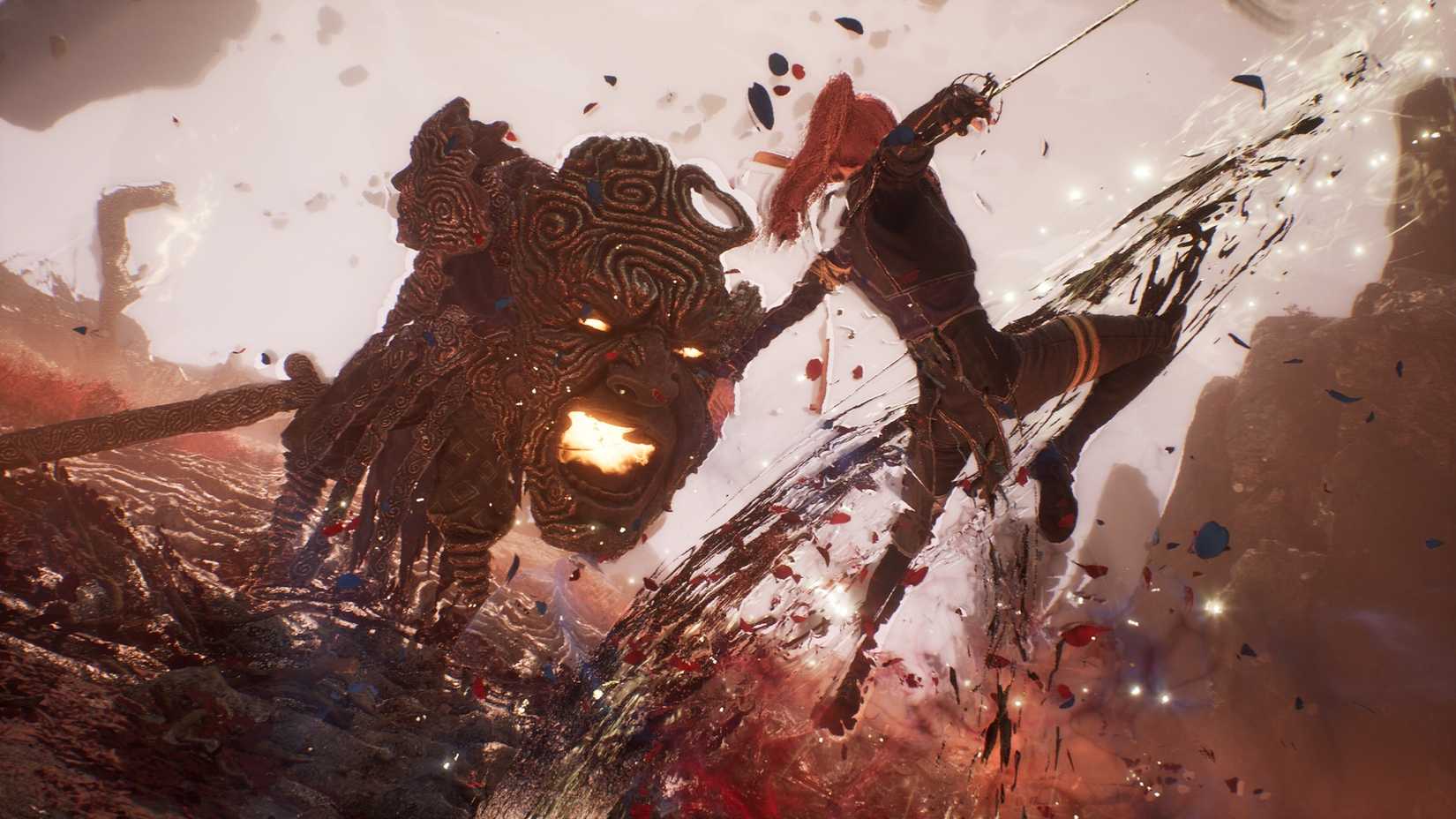 A redheaded warrior fights a stone monster in Clair Obscur: Expedition 33