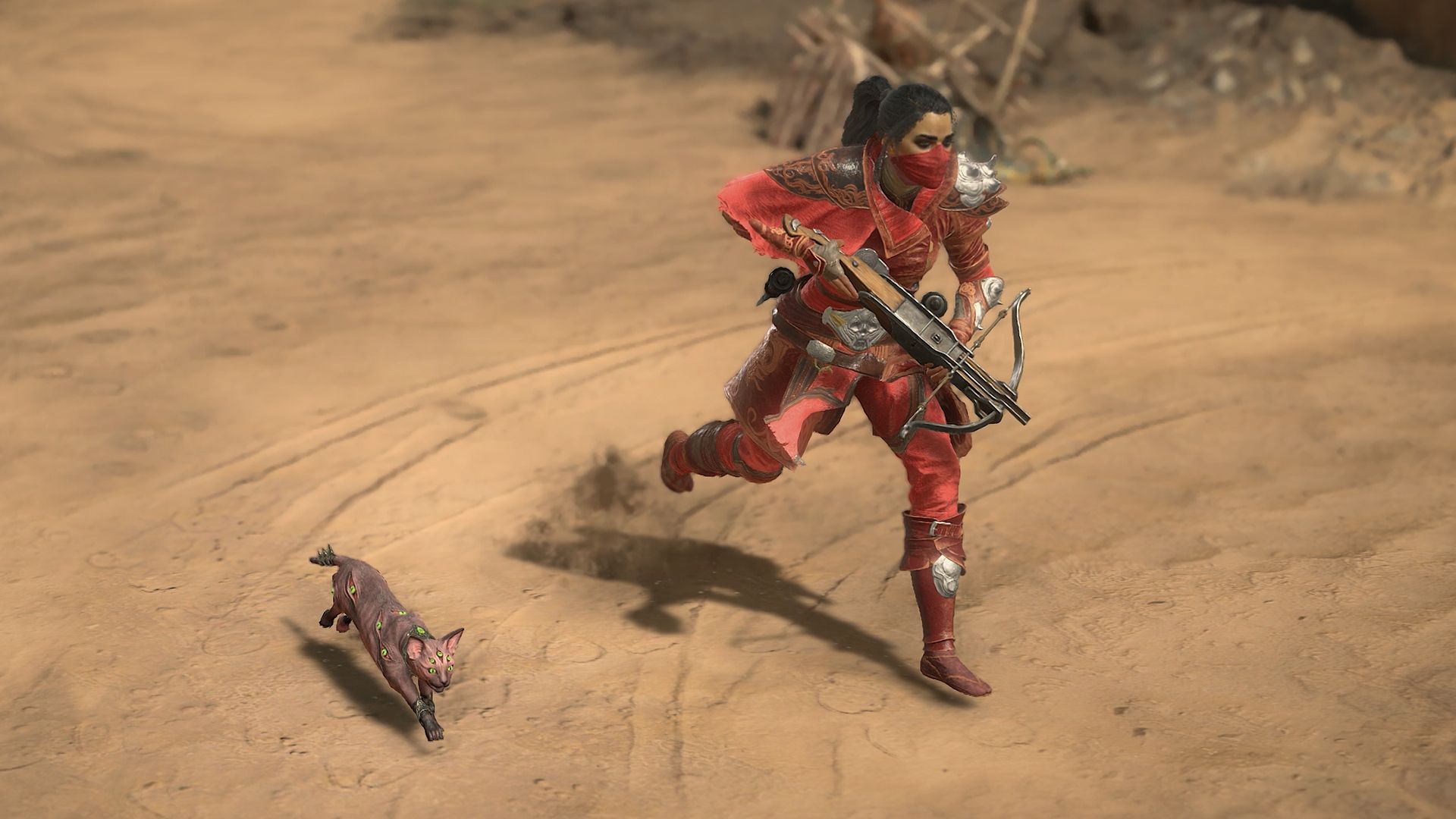 A Diablo 4 player character rogue holding a crossbow and sprinting in a desert alongside a demonic cat pet