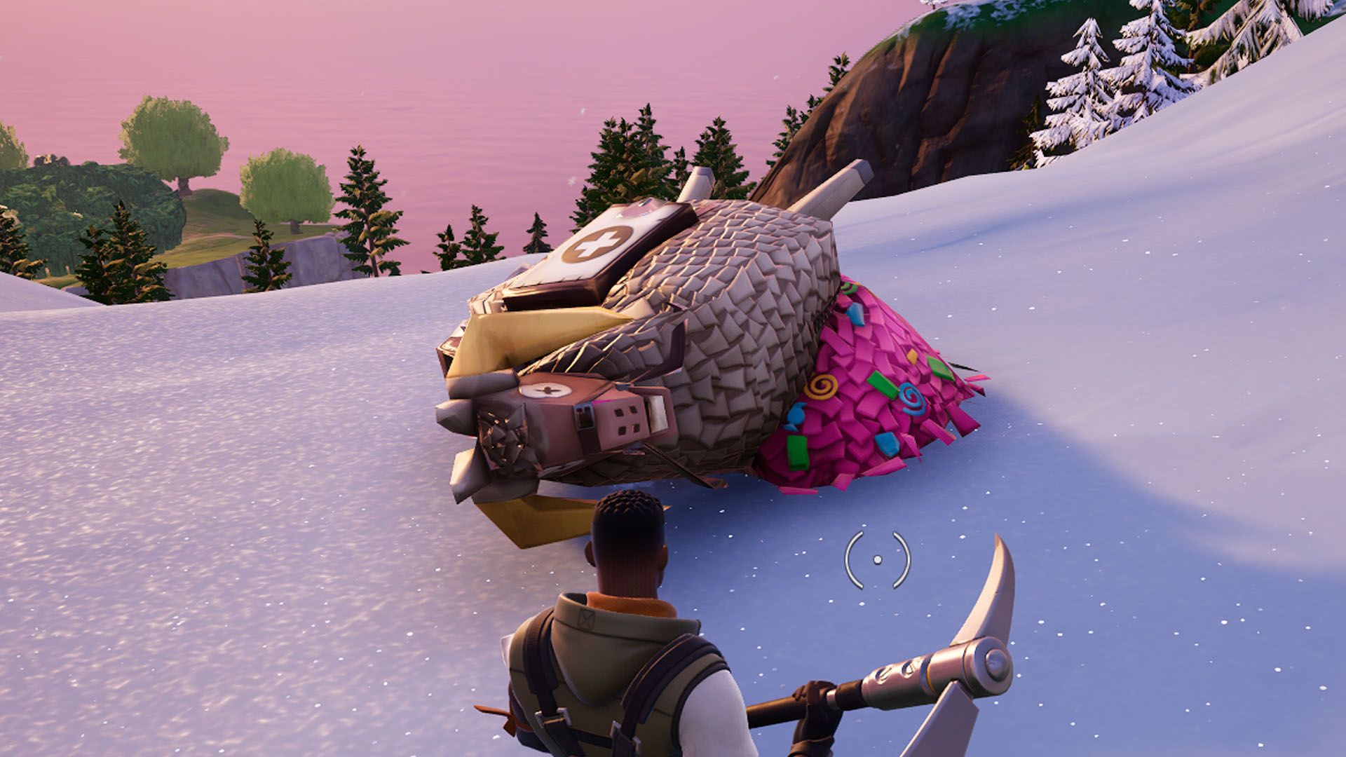 A Fortnite screenshot showing the character facing a giant pinata on the ground.