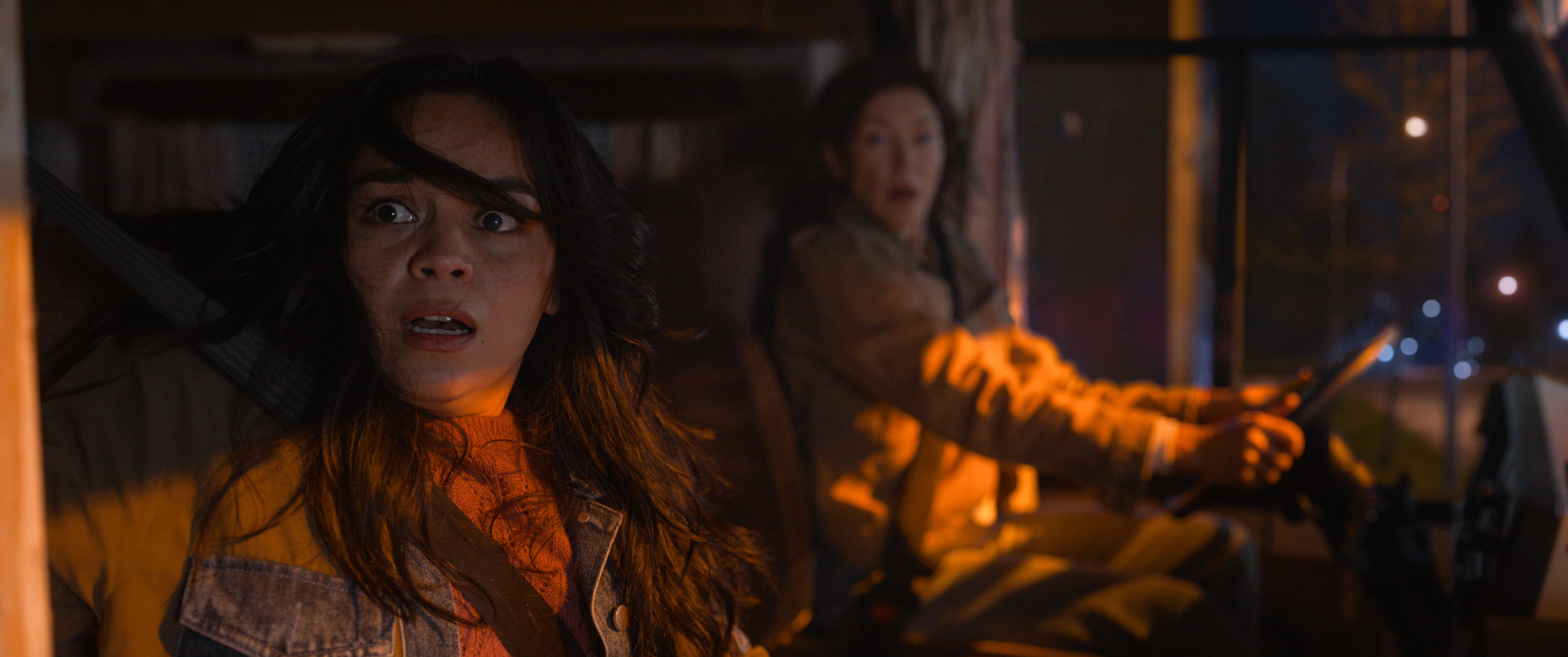Stefani (Kaitlyn Santa Juana) and her mother Darlene ( Rya Kihlstedt) both look disheveled and horrified while driving at night in Final Destination: Bloodlines