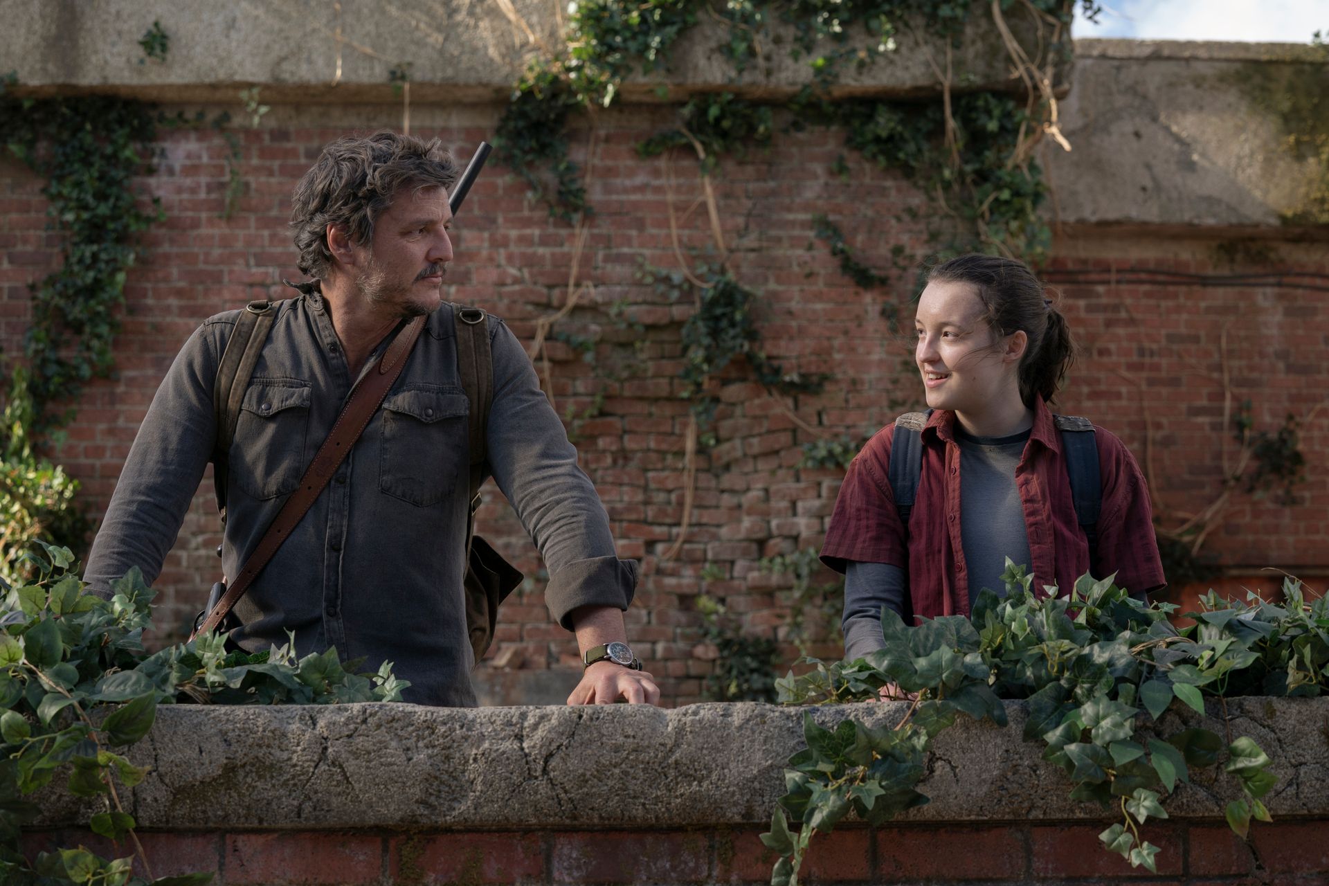 Joel (Pedro Pascal) and Ellie (Bella Ramsey) look at each other in The Last of Us season 1, episode 9