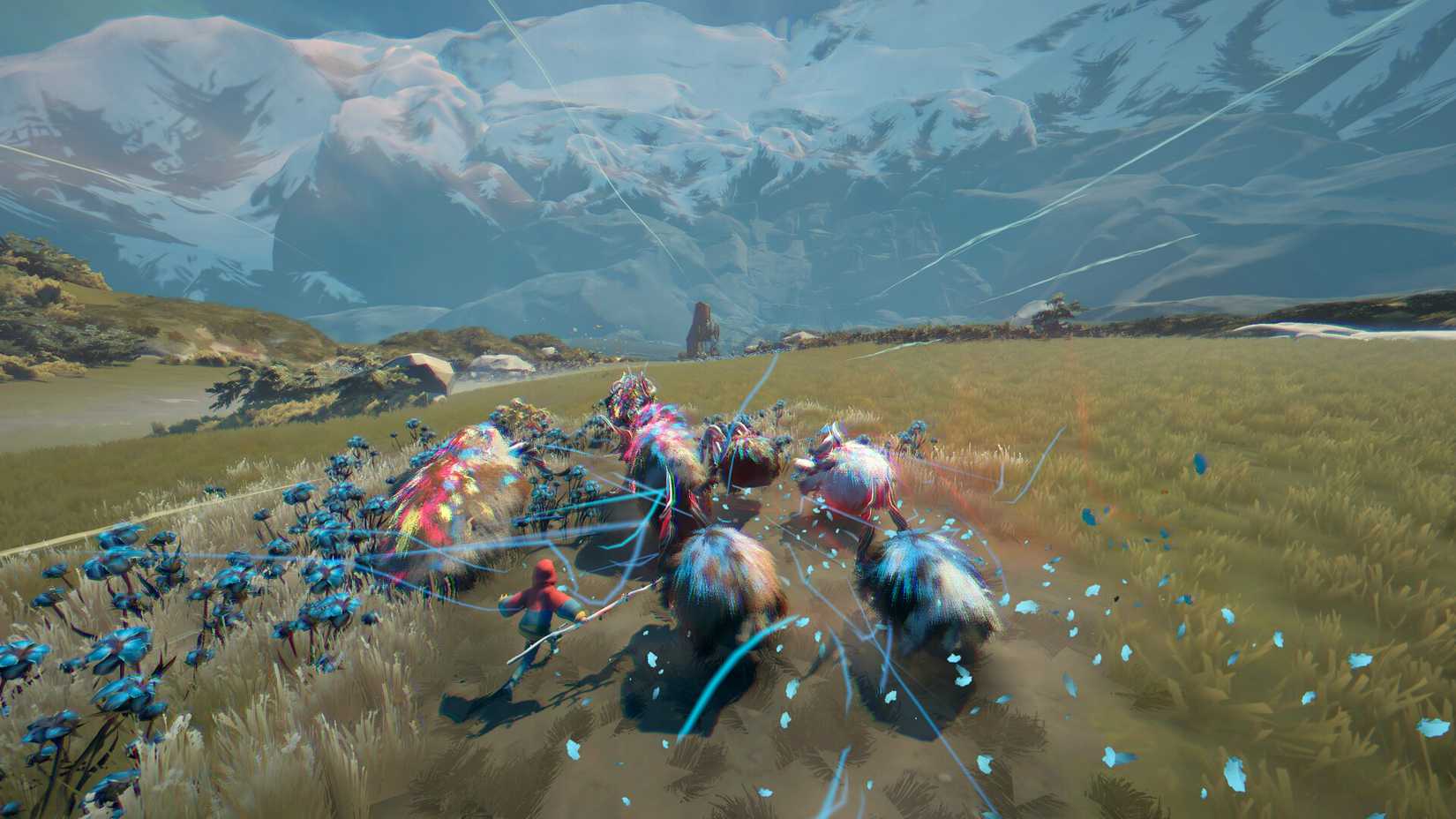 Eine grüne Glade voller blauer Blüten. Ein junger Mensch ist eine Gruppe von Calicorns, Kreaturen mit brauner und weißer Fell. Screenshot vor Hähne.