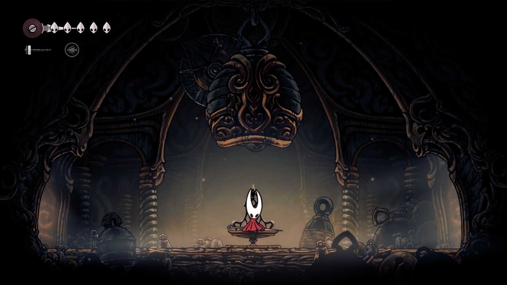 Hornet sitting on a bench under a large bell in Silksong.