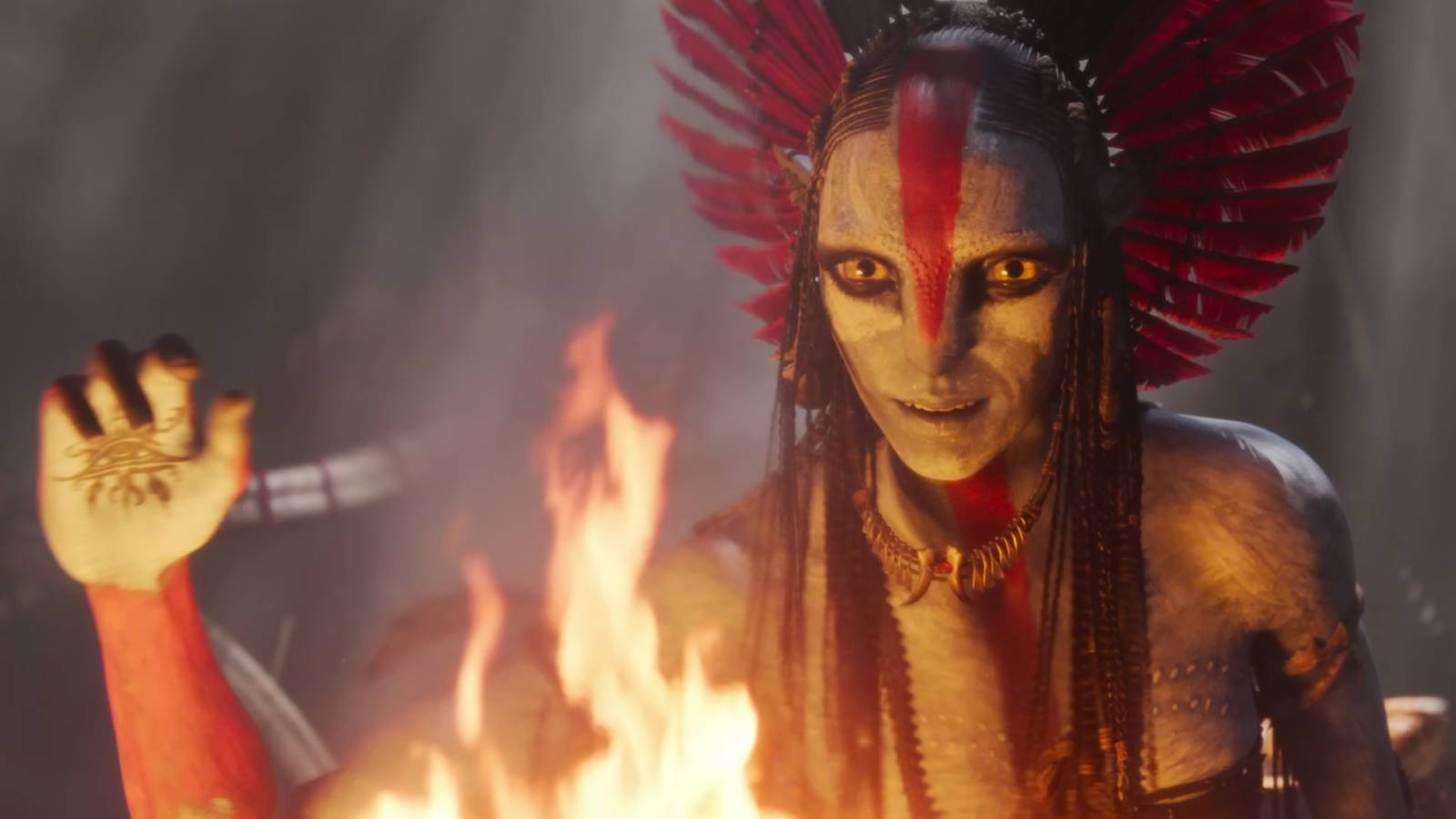 Varang from Avatar: Fire and Ash holding her hand over fire (but no ash)