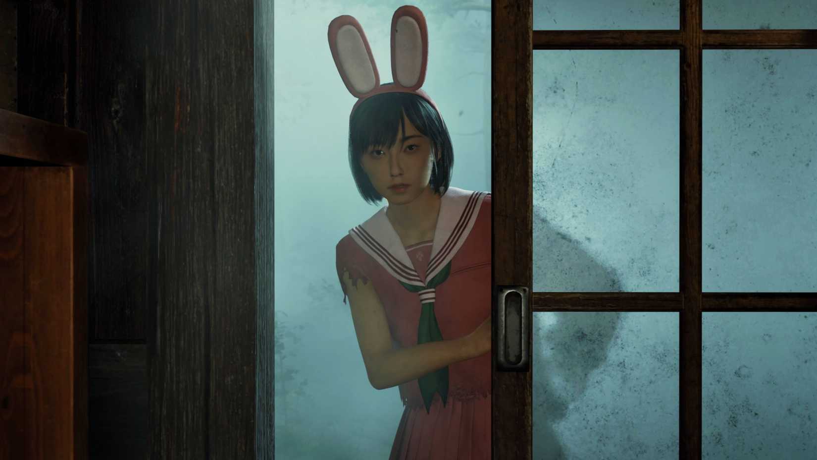 Donning her Pink Rabbit Costume, Hinako slides open a door.