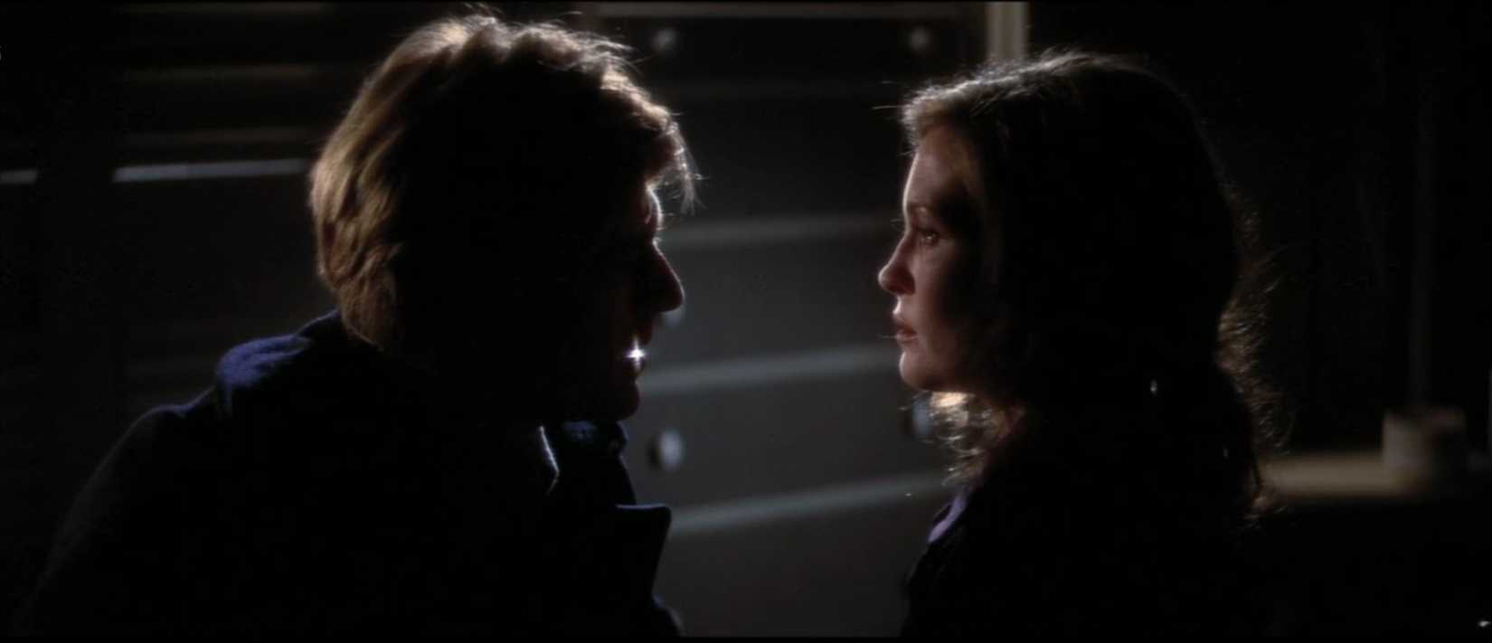 A tense moment between Robert Redford and Faye Dunaway in Three Days of the Condor
