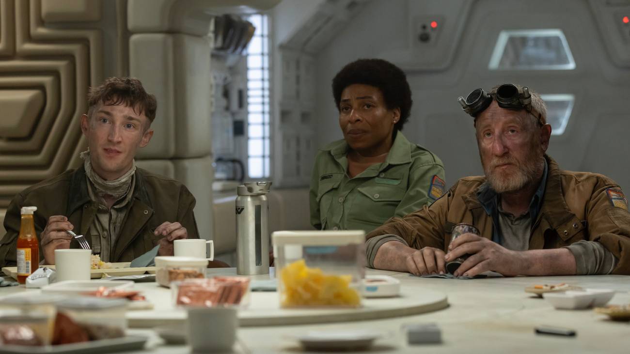 The Maginot's mechanic's apprentice, medical officer, and head mechanic all dine together.