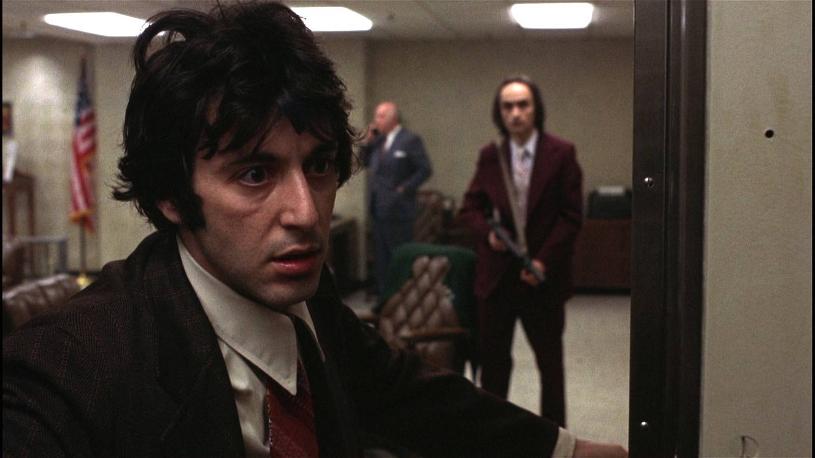 Al Pacino in a tense moment during the bank robbery sequence from Dog Day Afternoon