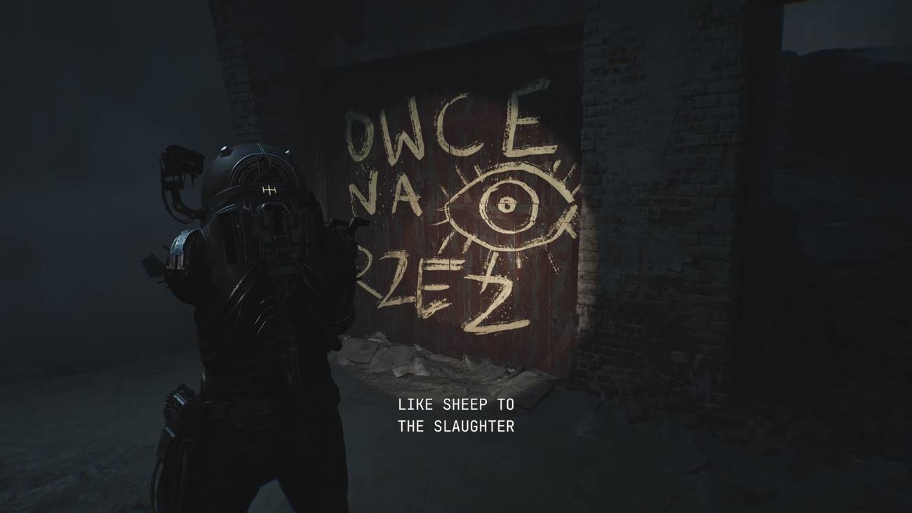 The Traveler stares at graffiti that reads, 