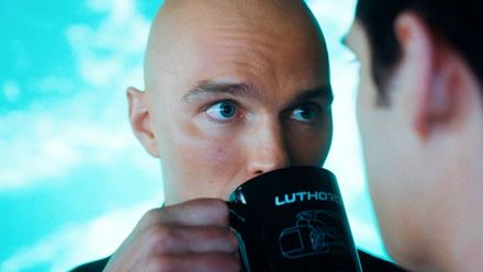 lex luthor sips from a coffee cup in 2025's Superman movie