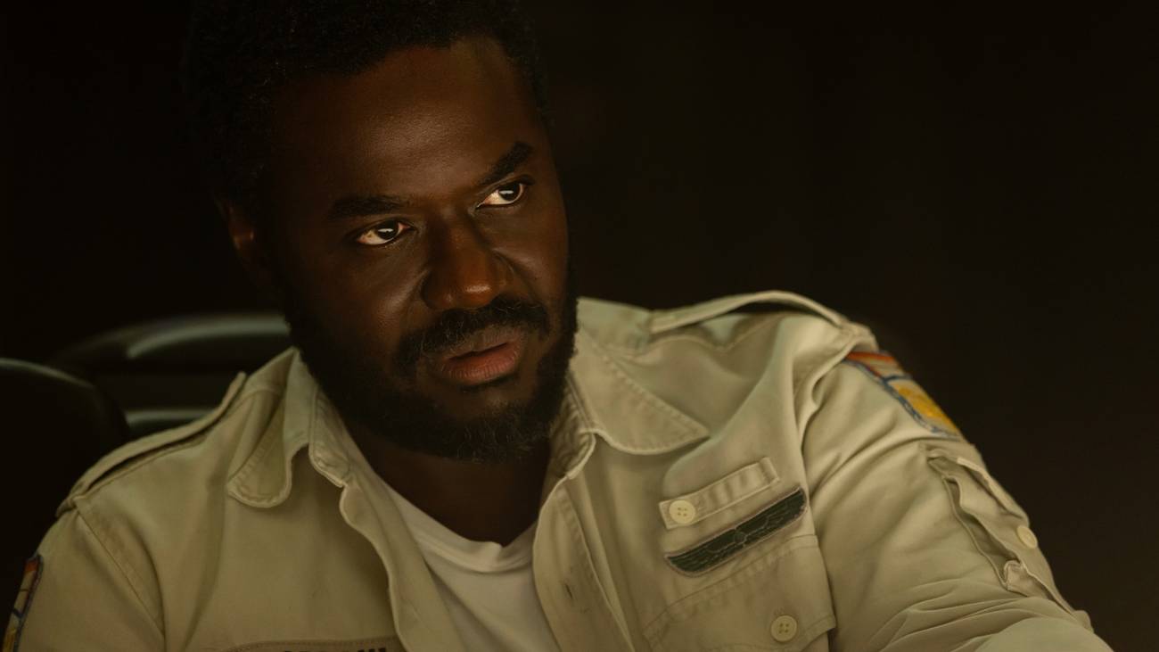 Morrow (Babou Ceesay) glares at something off-screen.