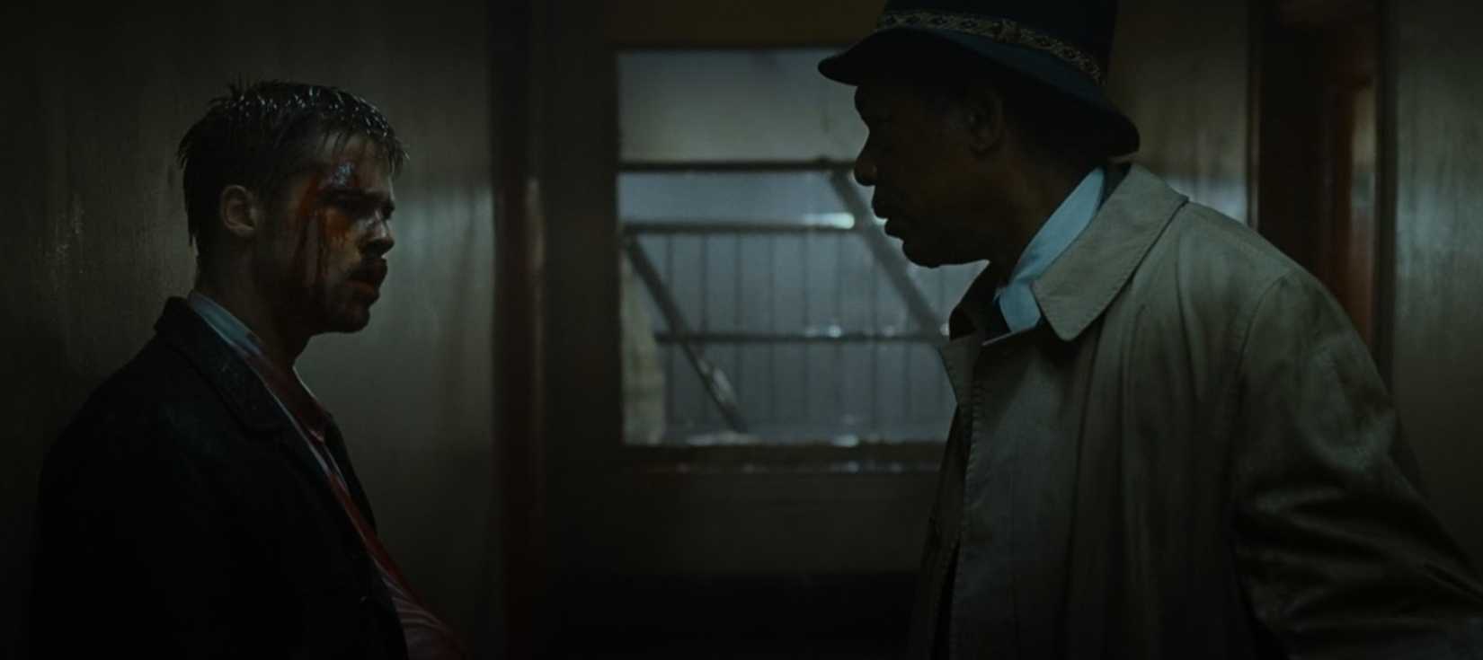 How David Fincher brought horror back a year before Scream Brad Pitt and Morgan Freeman argue in a characteristically shadowy hallway in a scene from the movie Seven