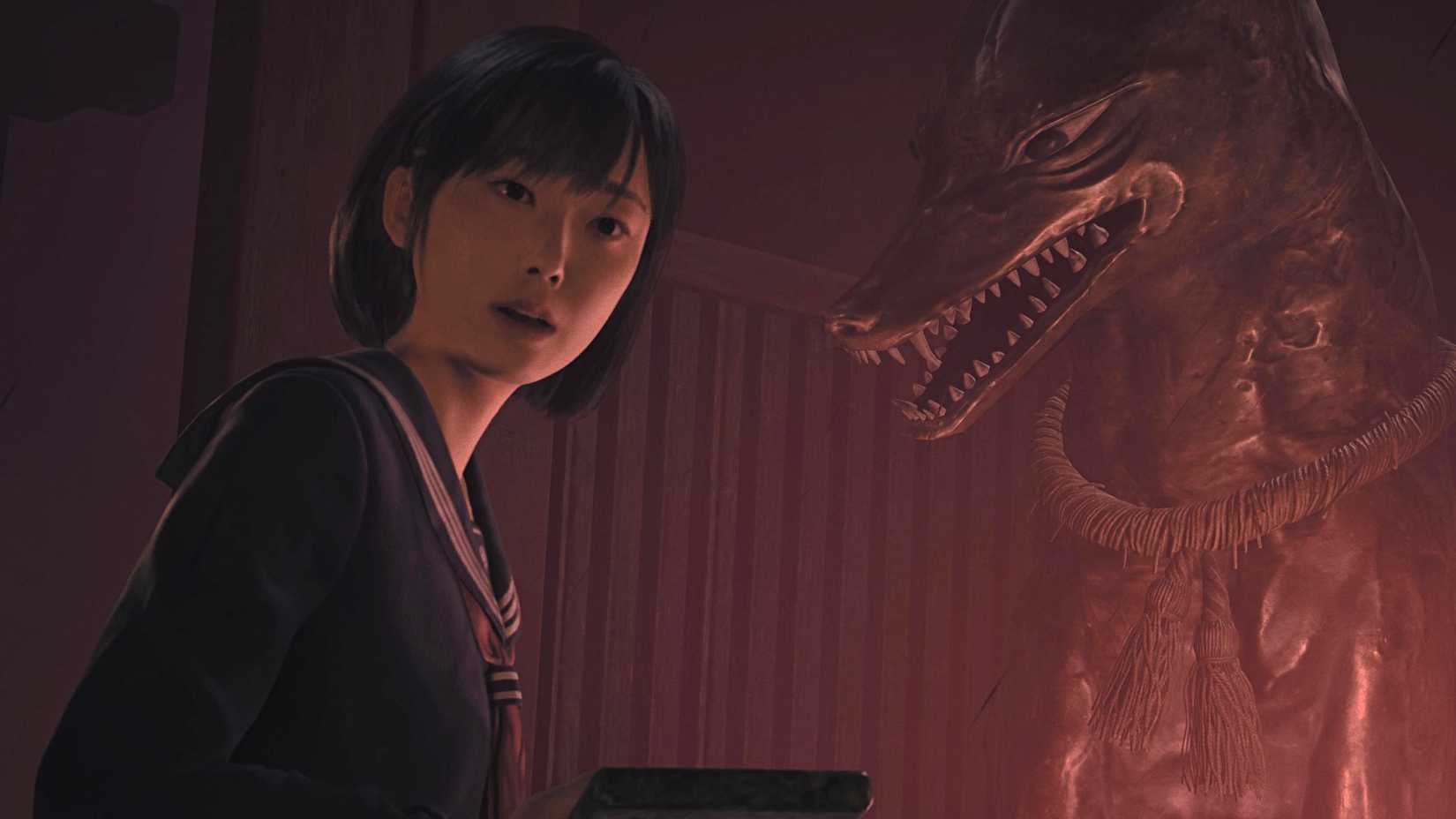 Hinkao near a fox statue in Silent Hill f's shrine vault puzzle