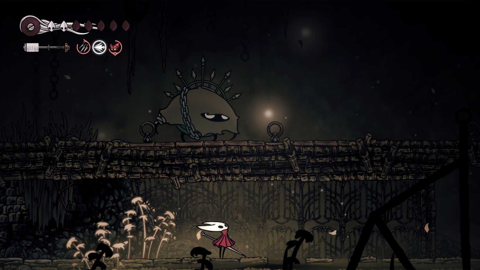 Hornet hiding from a Roachkeeper in Hollow Knight: Silksong.