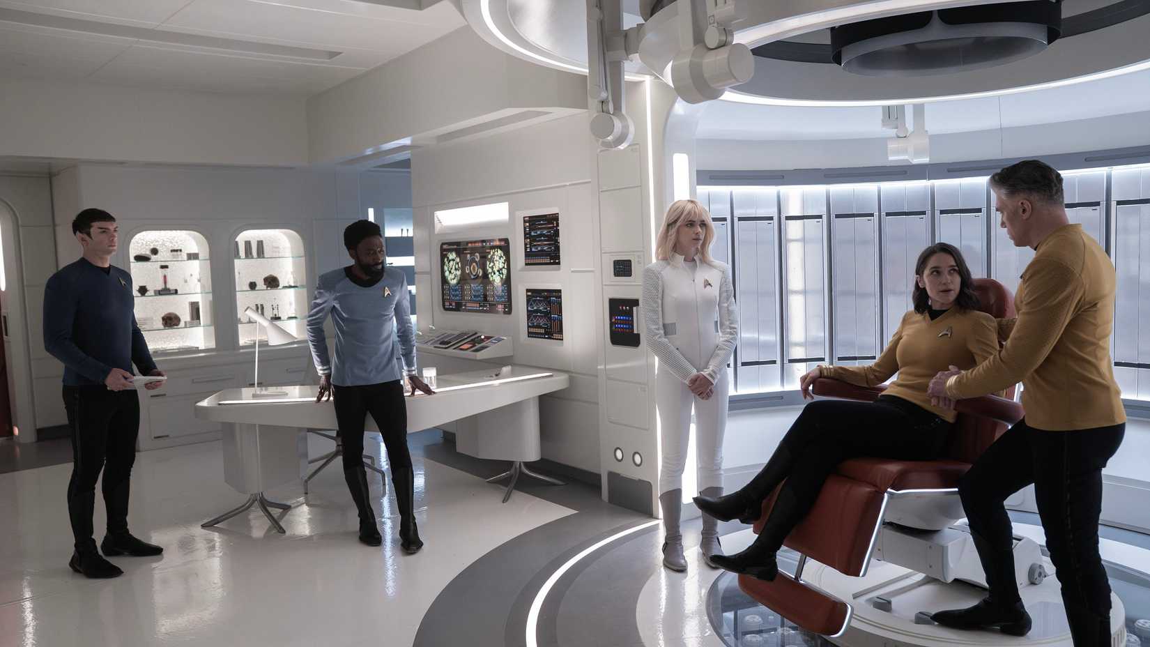 Ethan Peck as Spock, Babs Olusanmokun as Dr. M'Benga, Jess Bush as Chapel, Melanie Scrofano as Batel and Anson Mount as Capt. Pike in Star Trek: Strange New Worlds