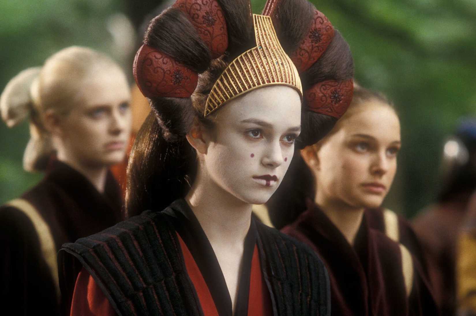 An image of Sabe (Keira Knightley) from Star Wars: Phantom Menace. She wears white make up and a traditional headpiece.