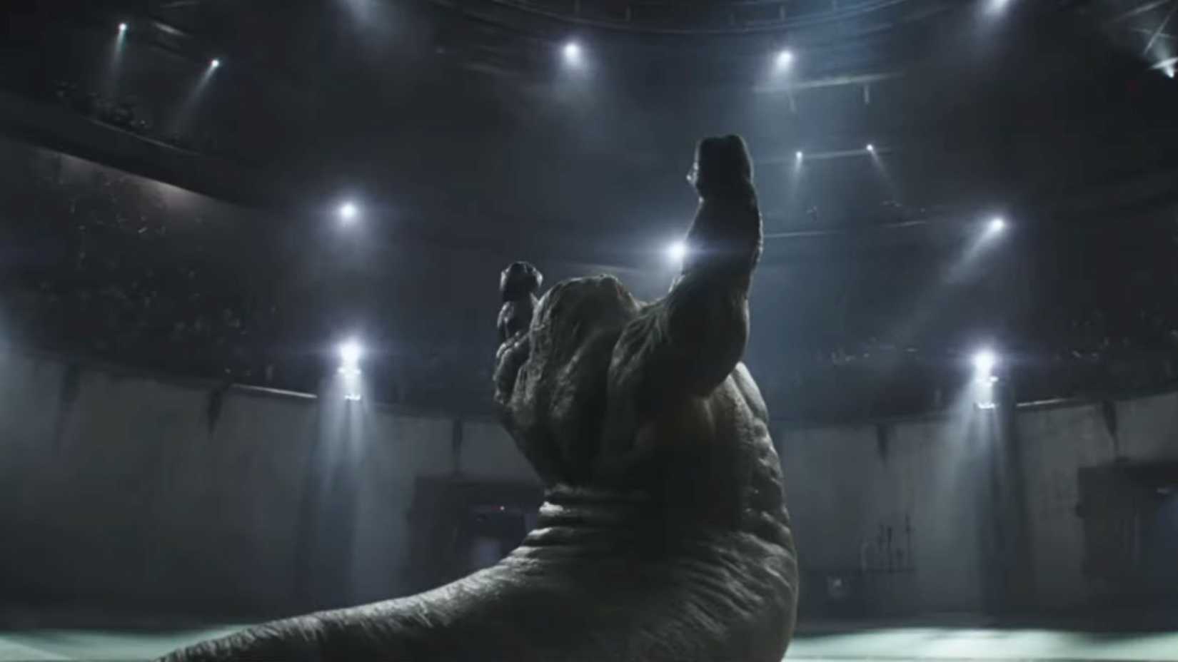 A screenshot from The Mandalorian and Grogu. It shows a muscular Hutt lifting his arms up in the air.