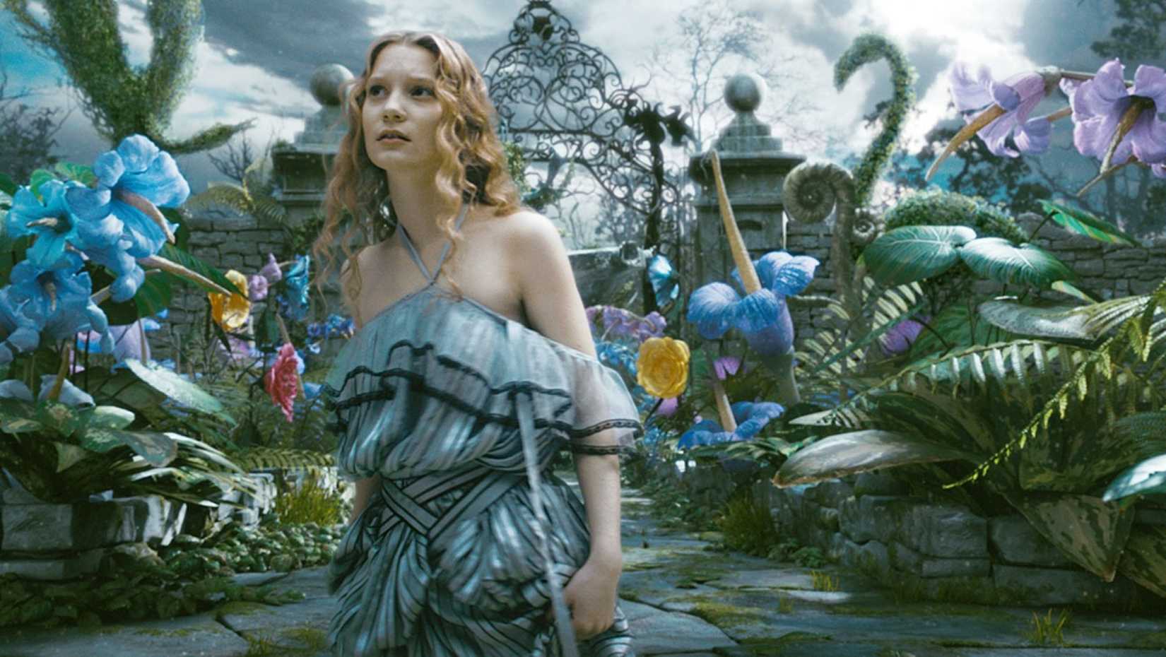 Mia Wasikowska wanders a mostly computer-generated wonderland in a scene from Tim Burton's 2010 film Alice in Wonderland