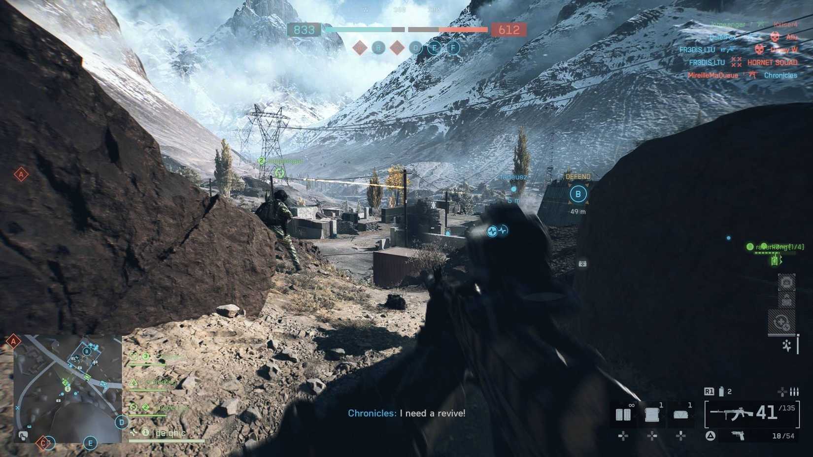 The player in Battlefield 6 wielding an LMG and looking out at a snowy mountain range.