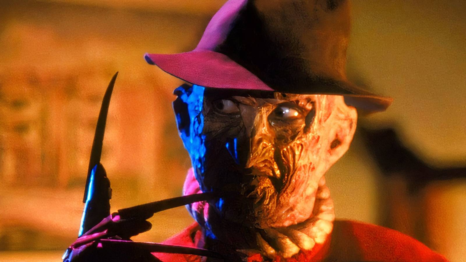 Freddy shows off the razor-sharp appendages on the ends of his glove.