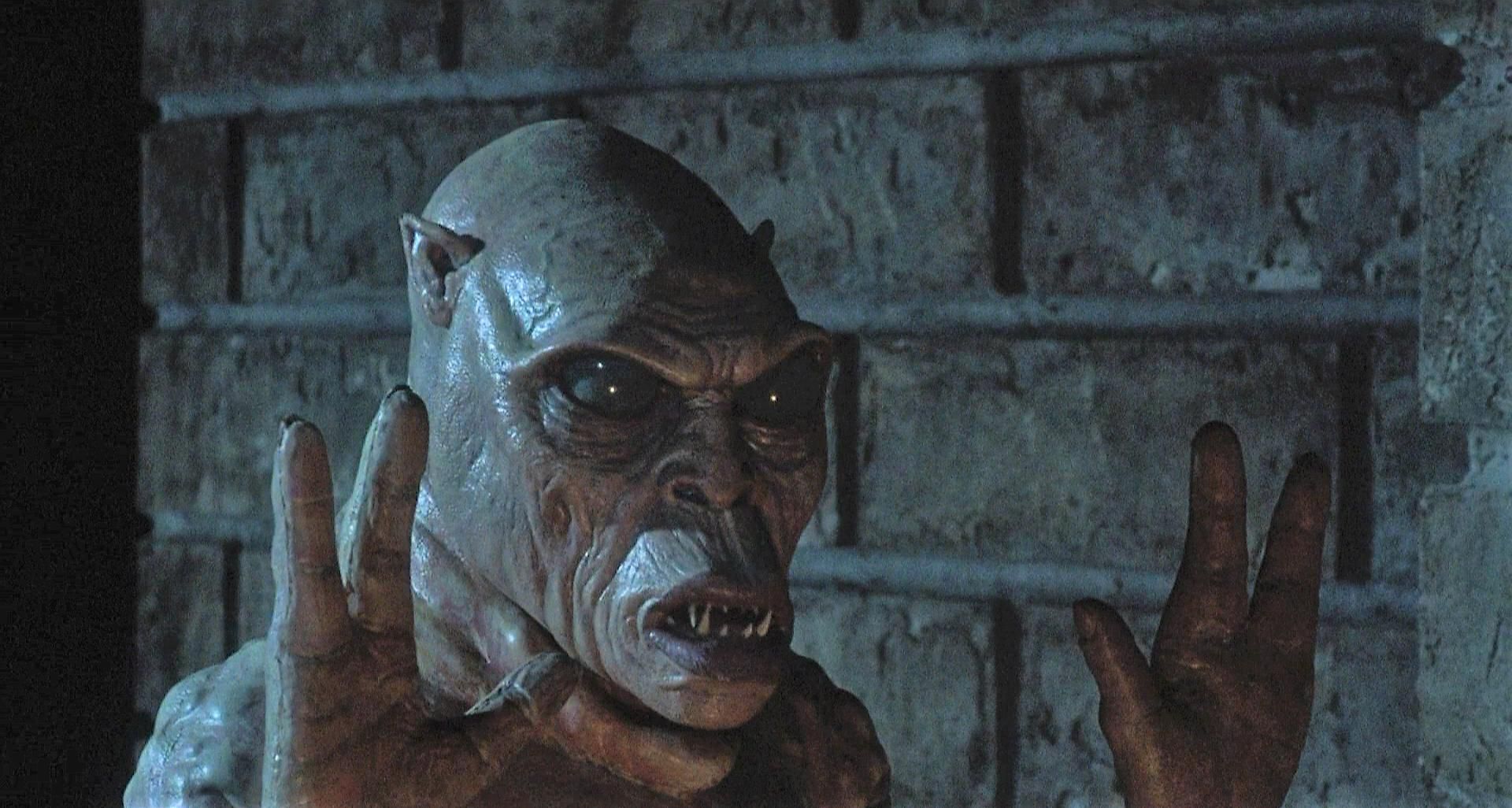 The Gate's evil little imp holding up its three-fingered claws