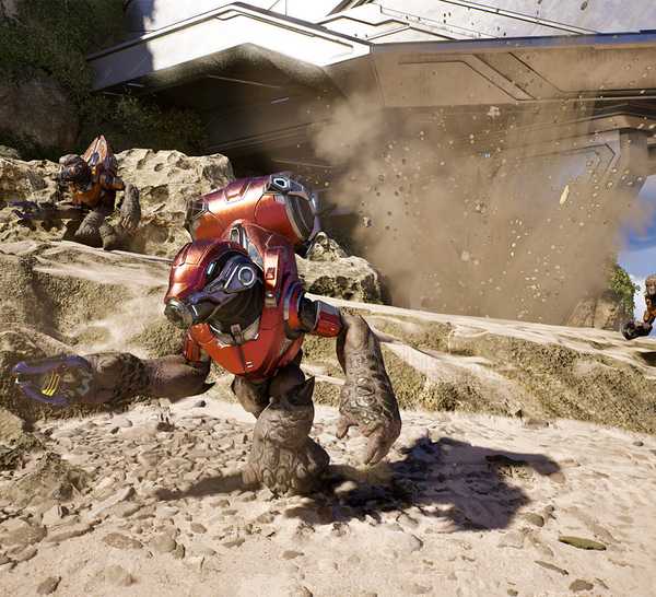 A grunt runs down a beach in Halo Campaign Evolved