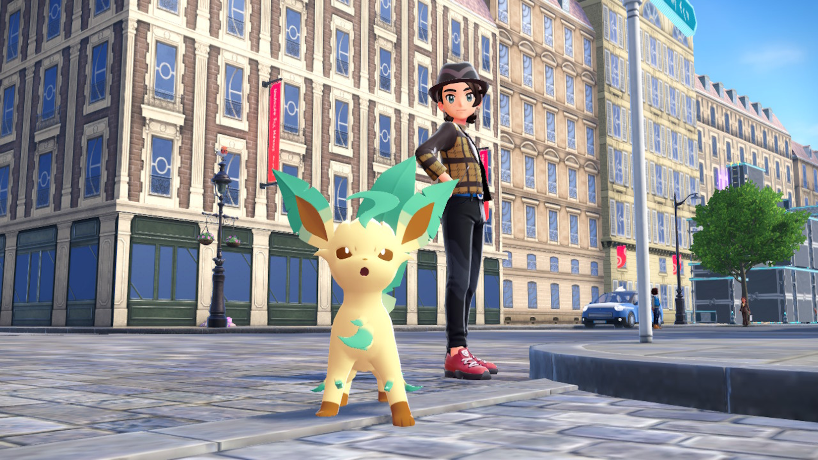A Pokémon trainer poses with a Leafeon in Pokémon Legends Z-A.
