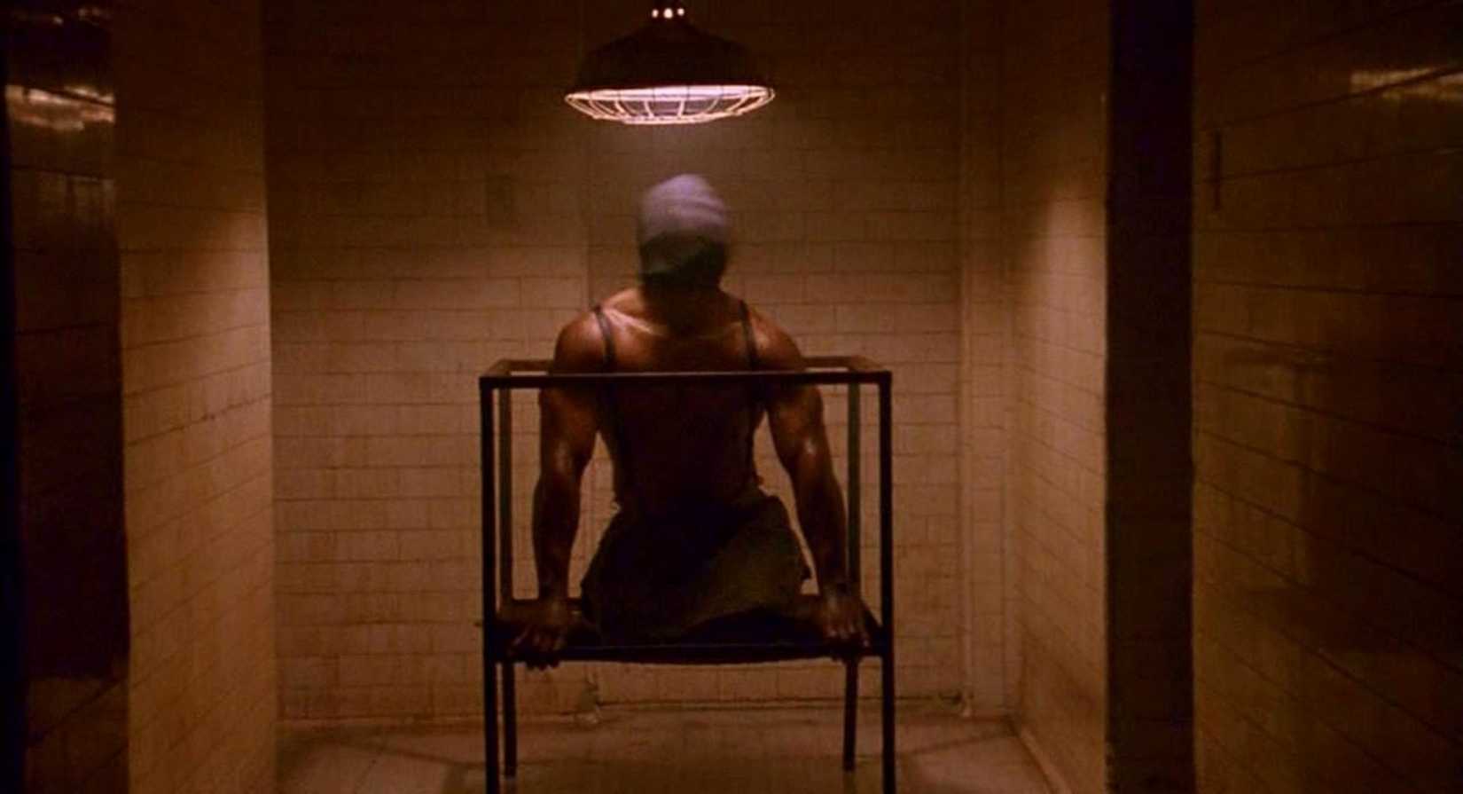 In a scary scene from the 1990 film Jacob's Ladder, an anonymous prisoner with a sack over his head writhes in some kind of metal box. 