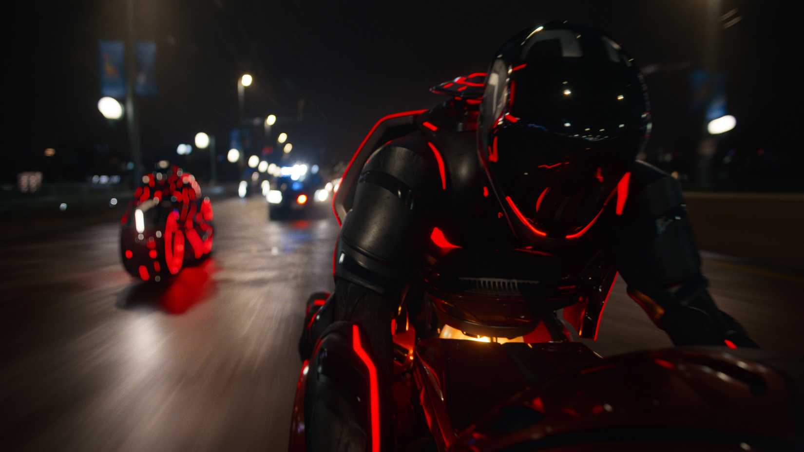 Light cycles race down a street in the real world in Tron: Ares