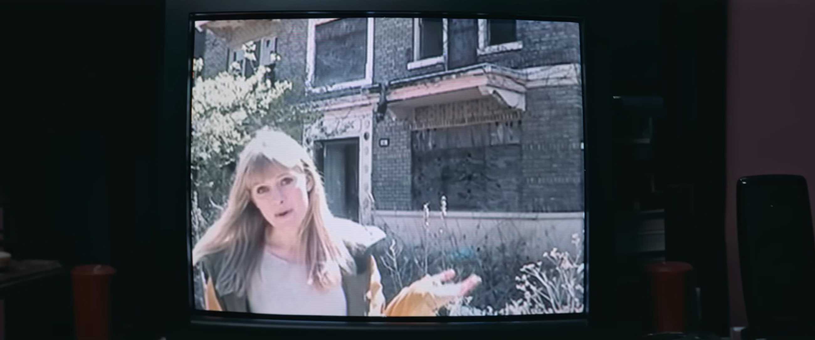 Shelby Oaks still: Riley in a video recording