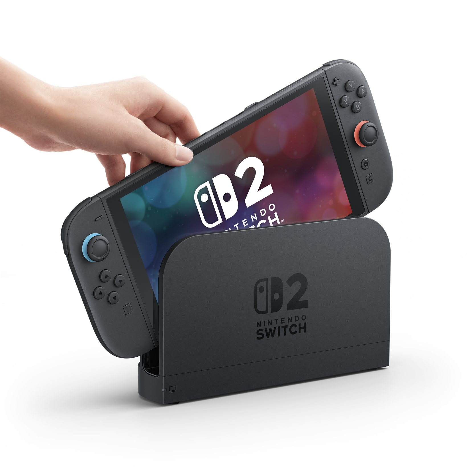 A Nintendo player puts a Switch 2 in a dock that connects to a TV