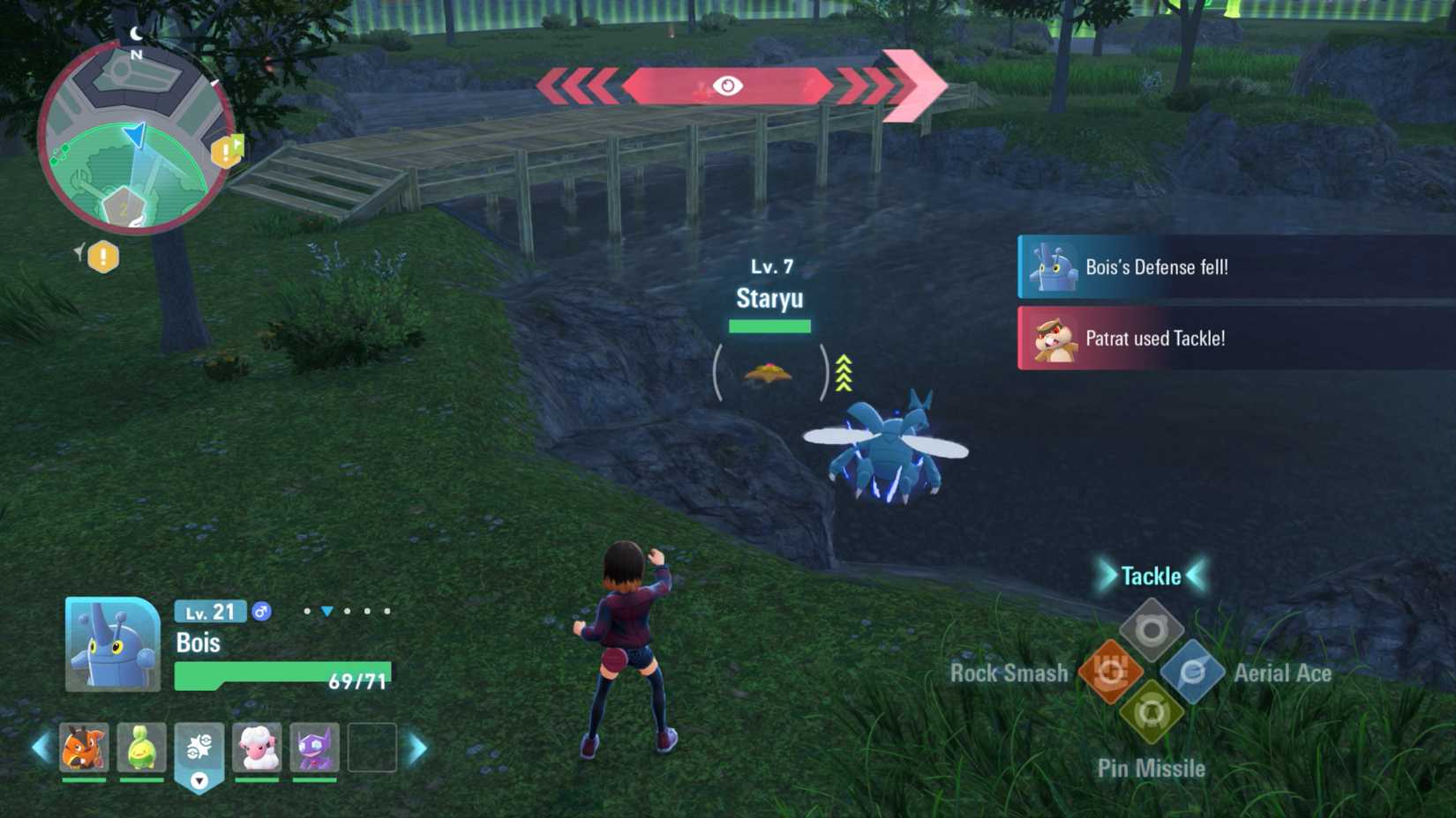 A wild zone battle at night featuring a Heracross versus a Staryu in Pokémon Legends: Z-A.