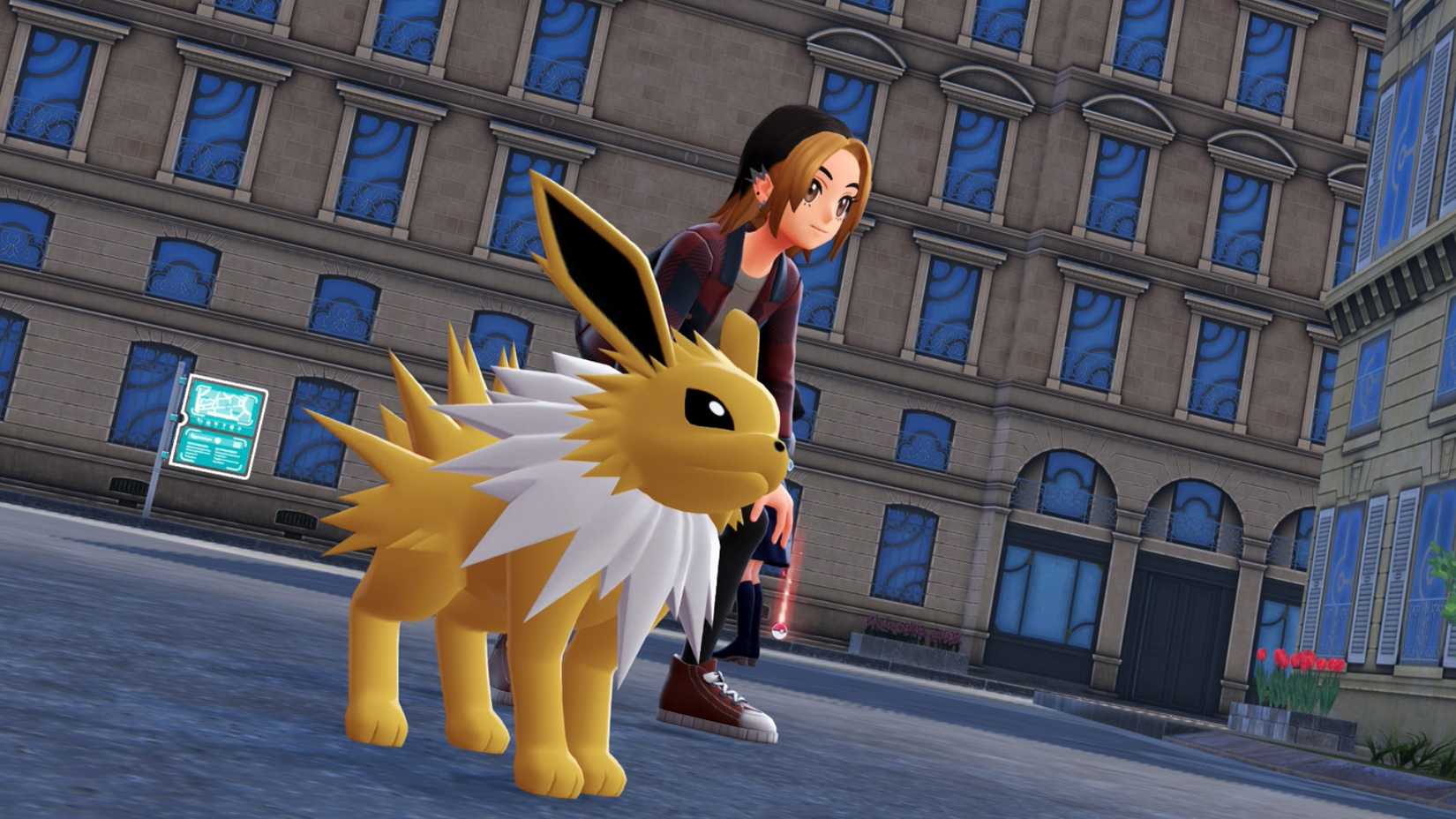 A trainer bends down to pose with their Jolteon in Pokémon Legends: Z-A.