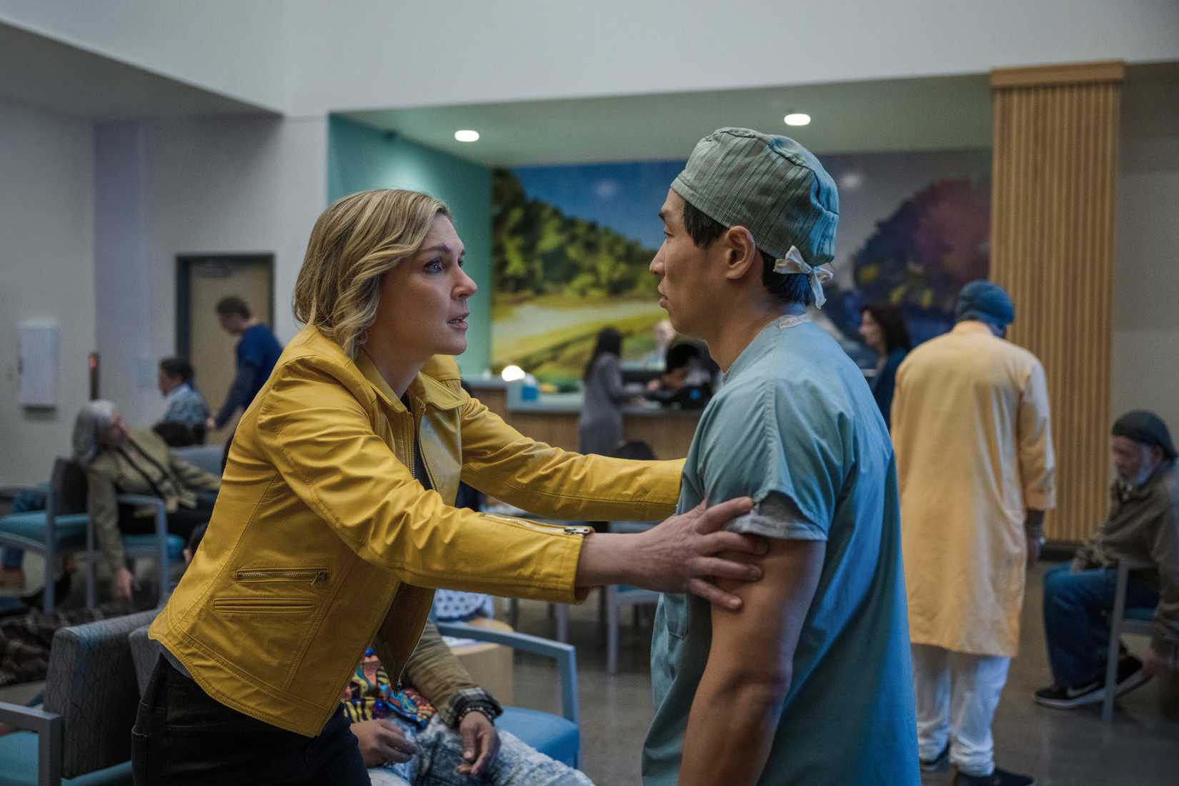 Rhea Seehorn's character Carol speaks with a doctor in Pluribus