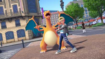 A trainer poses with Charizard in Pokemon Legends: Z-A.