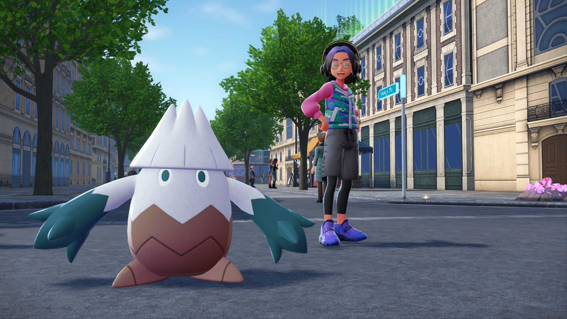 A trainer and their Pokemon posing on the streets of Lumiose City in Pokemon Legends Z-A.