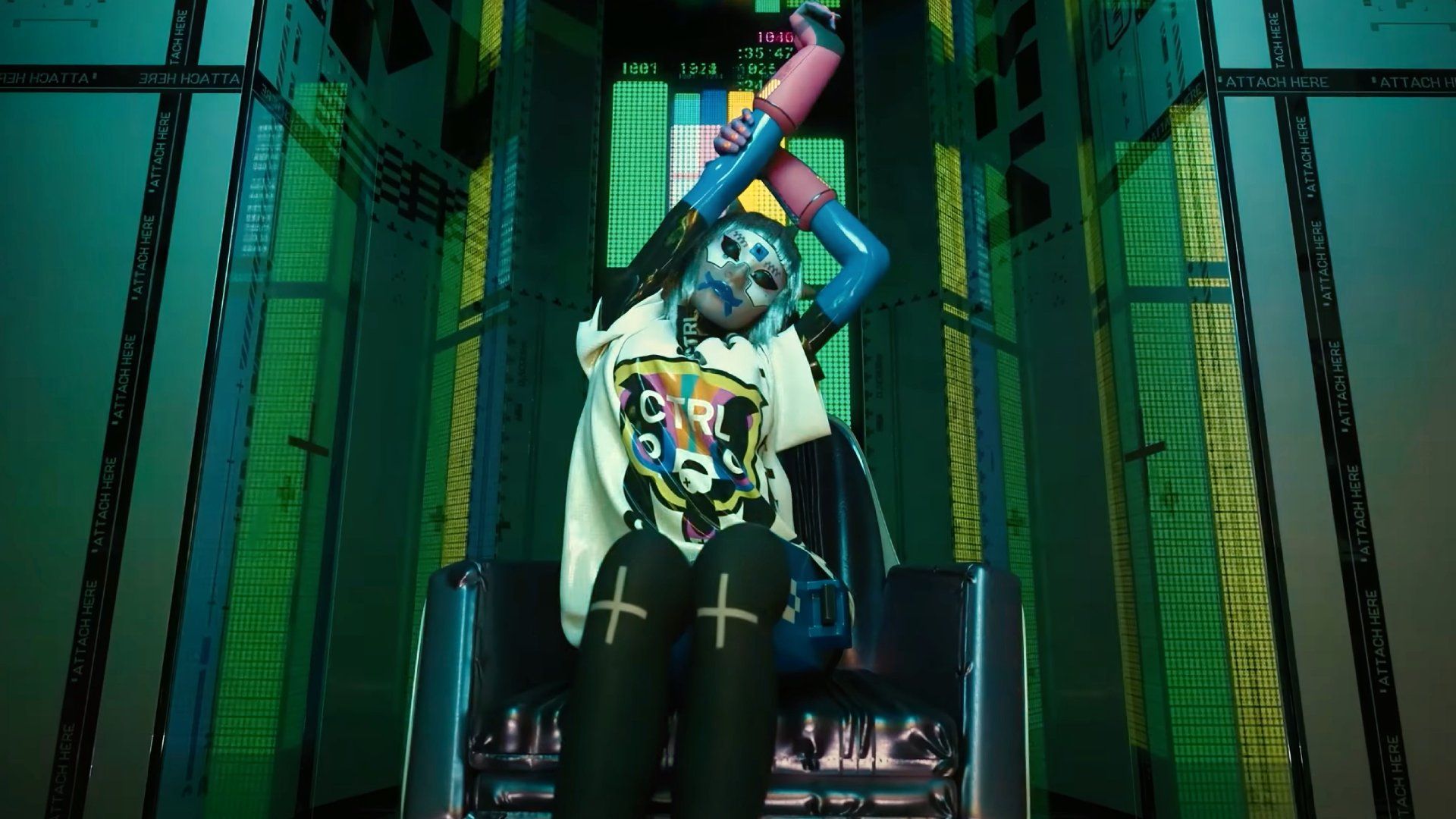 A female Marathon character stretches lethargically as she sits in a chair surrounded by screens.