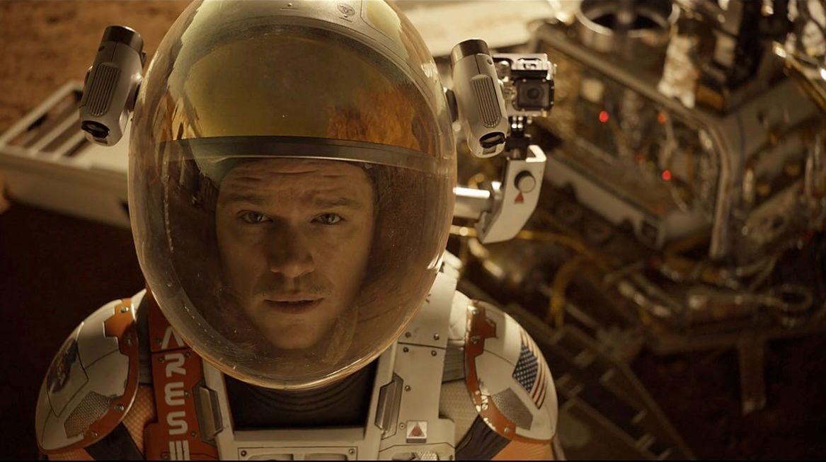 Matt Damon as Mark Watney wears an Ares III space suit in The Martian