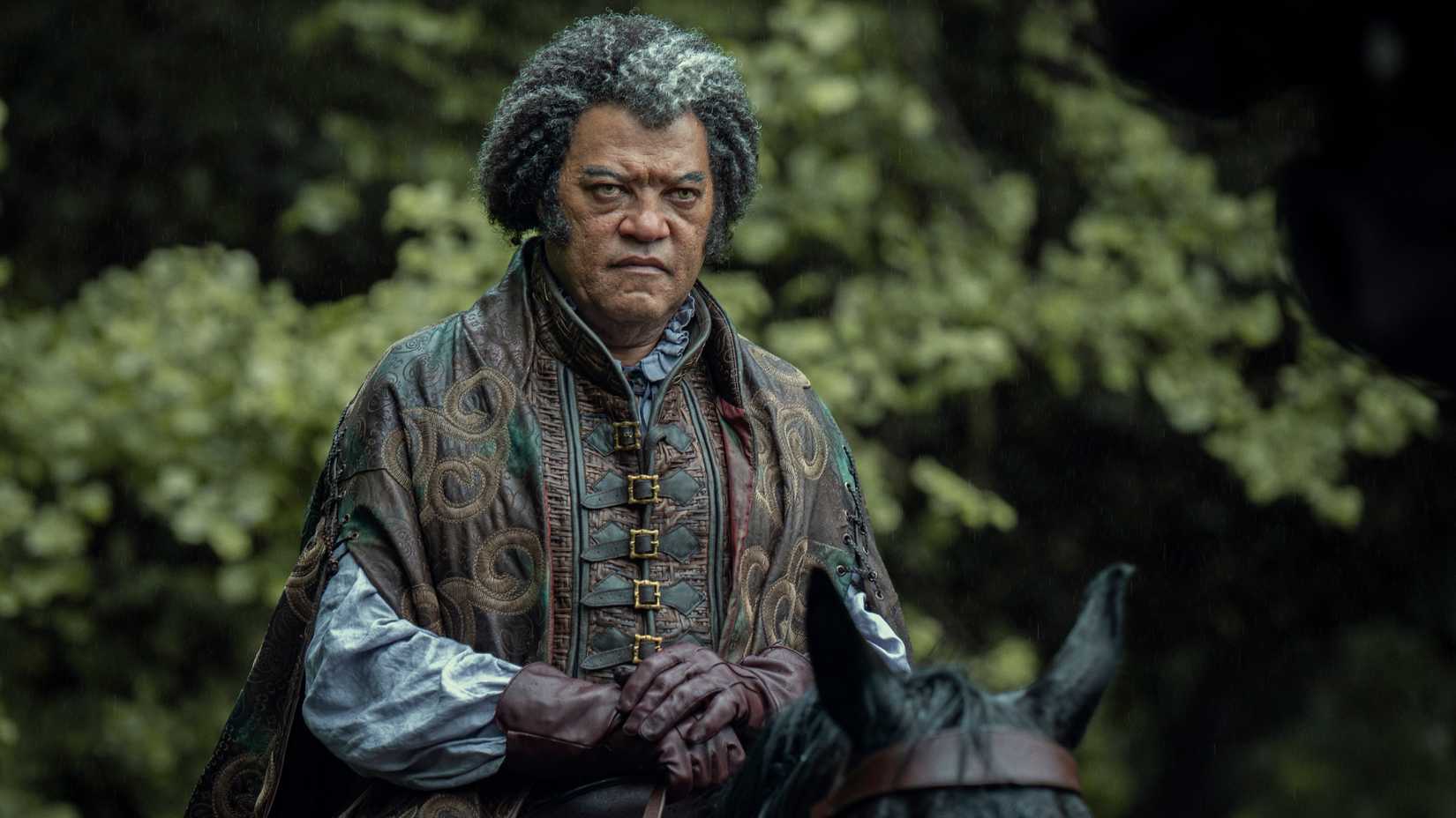 Showrunner reveals the inspiration for the 'soup episode' Regis (Laurence Fishburne) rides a black horse in The Witcher