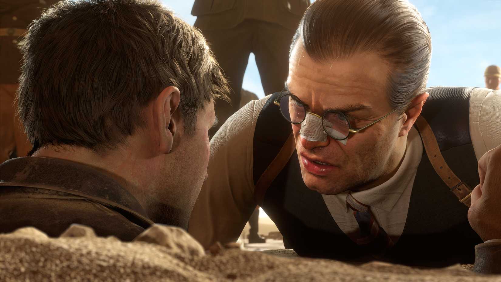 एमेरिच वॉस अपनी नाक पर पट्टी बांधकर रेत में दबी इंडियाना जोन्स का सामना करता है