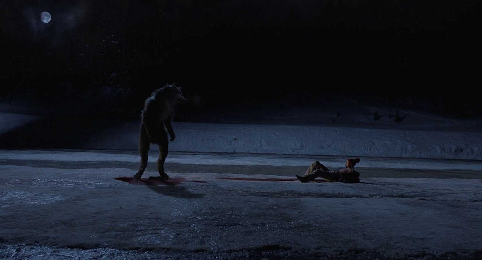 A werewolf looming over a fallen man in The Wolf of Snow Hollow
