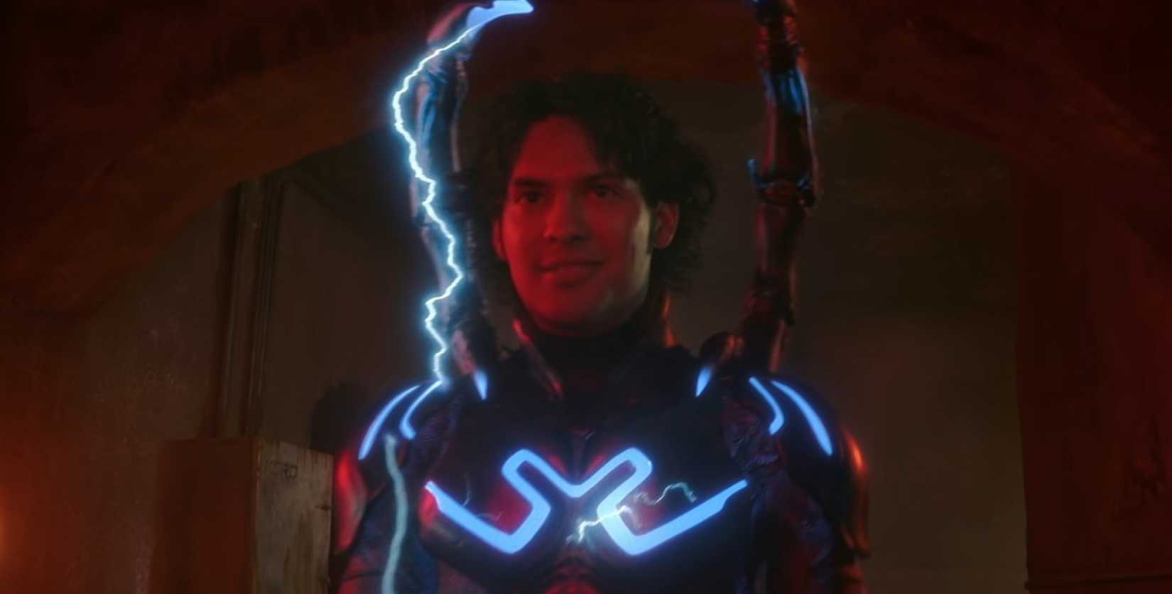 Jaime starts to deploy his exoskeleton supersuit in a scene from DC superhero movie Blue Beetle.