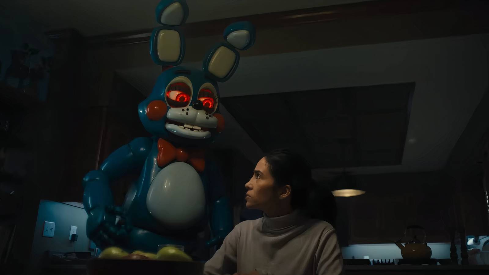 Bonnie, a rabbit animatronic, sneaks up on a woman sitting at her kitchen table.