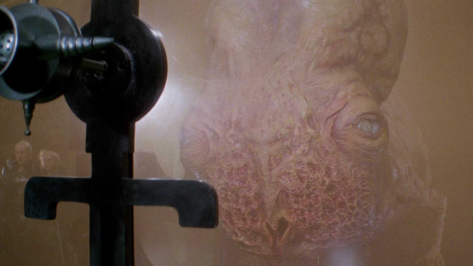 A mutated Navigator suspended in a tank in David Lynch's Dune