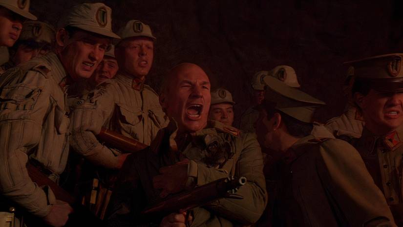 Patrick Stewart yelling while holding a small pug in David Lynch's Dune